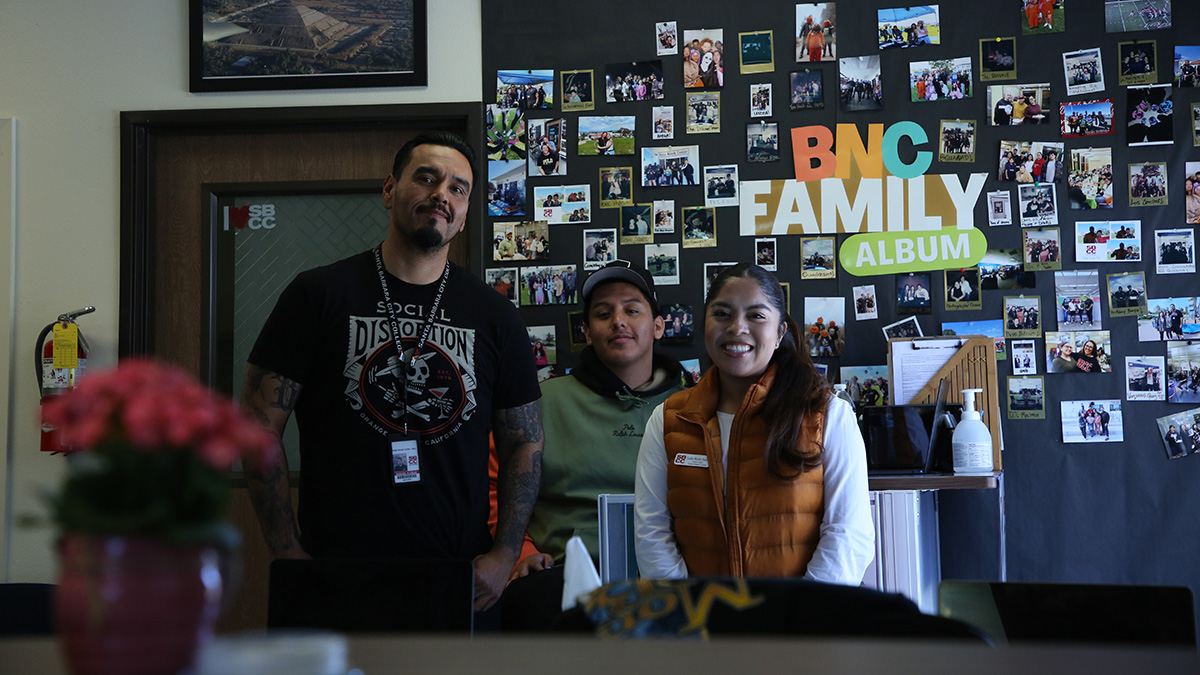 Team members posing for a photo at the pantry